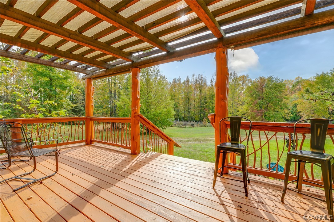 4895 Old Fredericksburg Road Mineral, VA 23117 - Photo 33 of 39 a view of balcony with wooden floor and fence