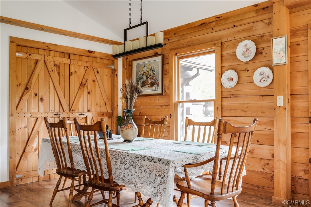 4895 Old Fredericksburg Road Mineral, VA 23117 - Photo 7 of 39 a dining room with a wooden table and chairs