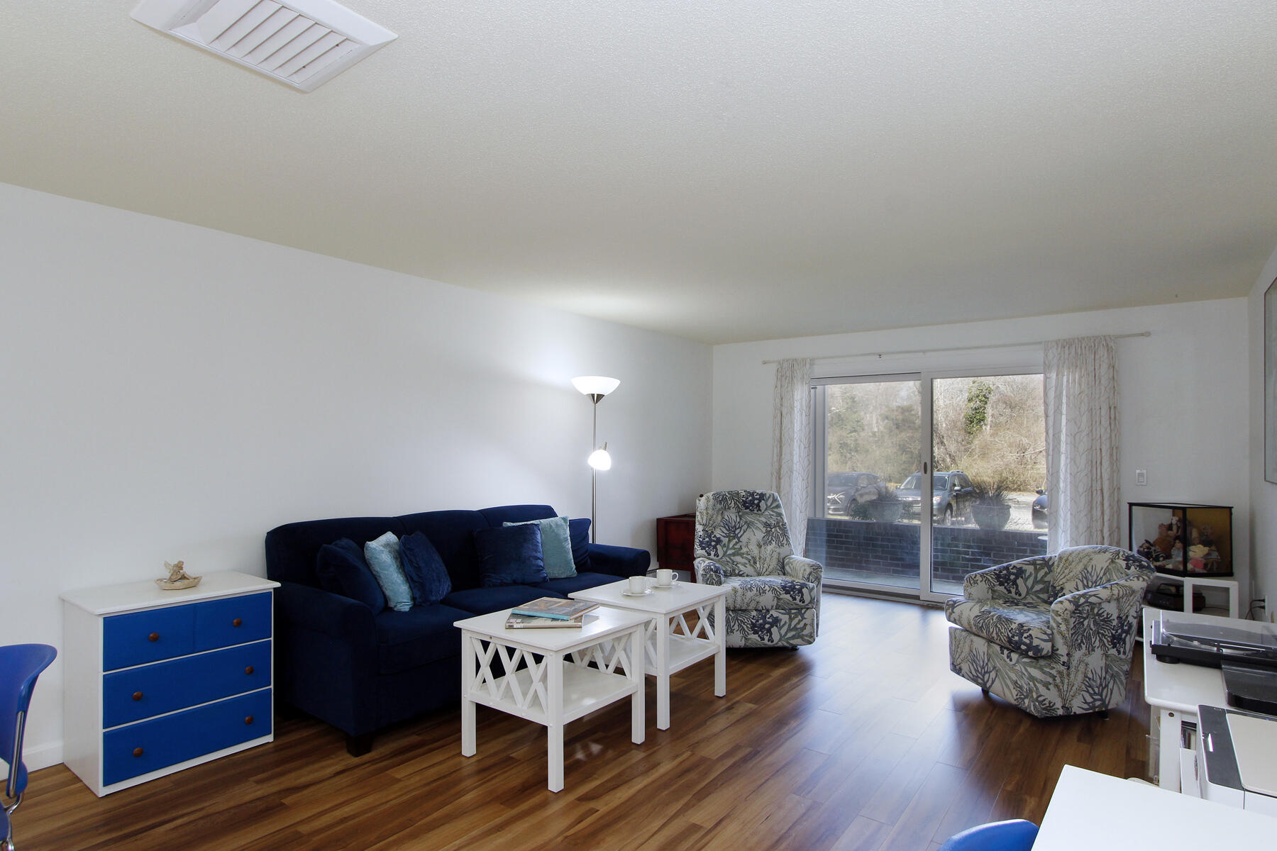 42 Old Colony Way, Unit 6 Orleans, MA 02653 - Photo 4 of 22 a living room with furniture and a wooden floor