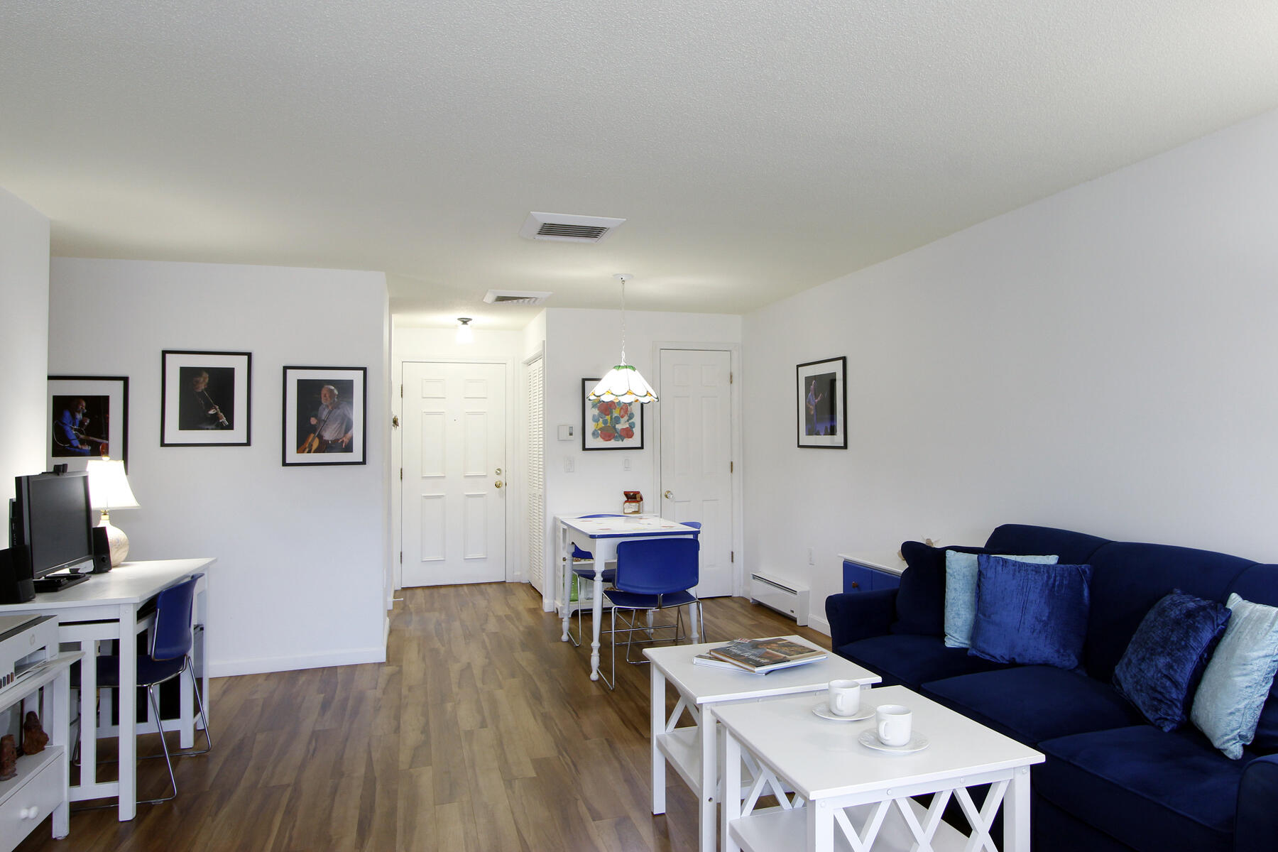 42 Old Colony Way, Unit 6 Orleans, MA 02653 - Photo 7 of 22 a living room with furniture and wooden floor