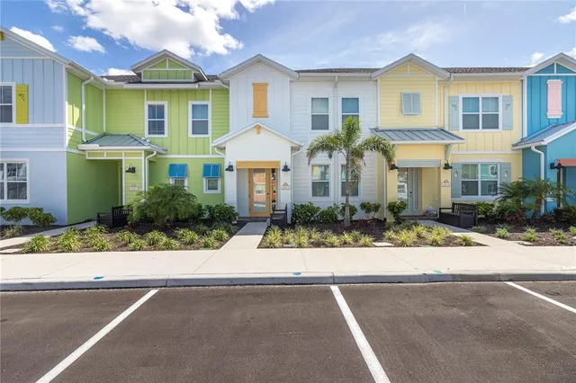 a front view of a residential houses with street