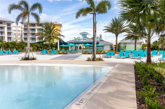 a view of street along with retail shop and buildings