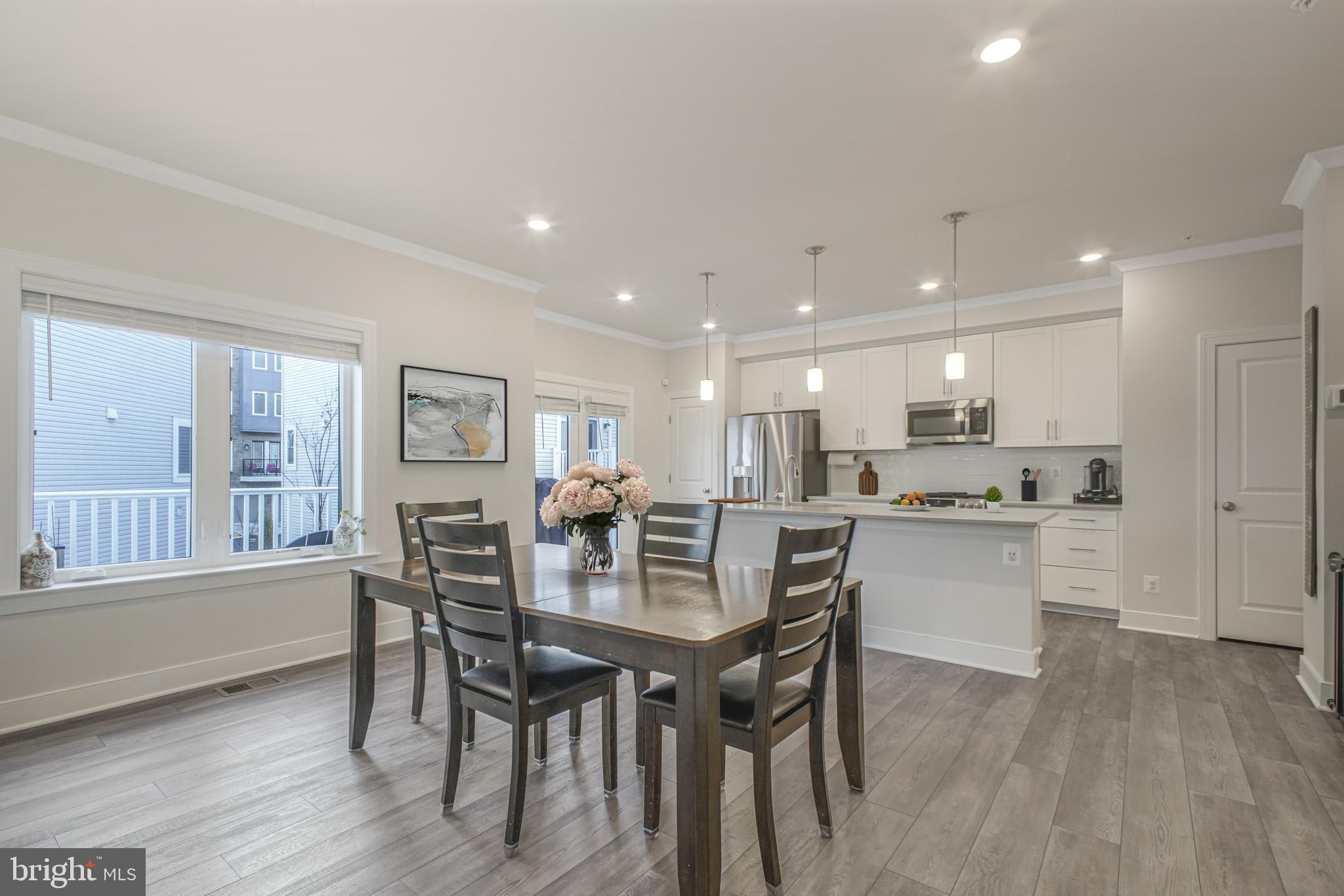 15535 Smoke Woodbridge, VA 22191 - Photo 12 of 44 a view of a dining room with furniture and wooden floor