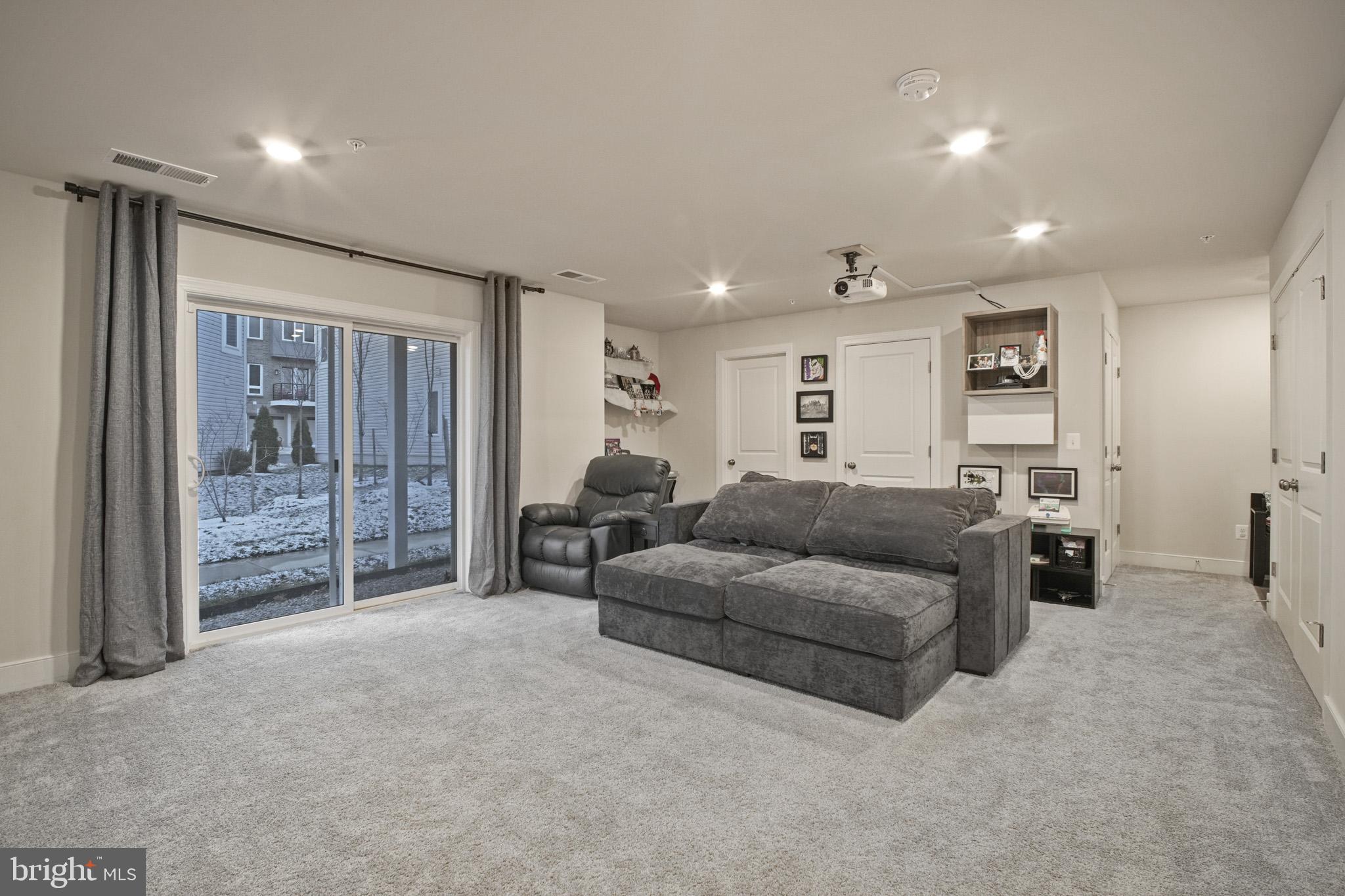 15535 Smoke Woodbridge, VA 22191 - Photo 38 of 44 a living room with furniture and a large window