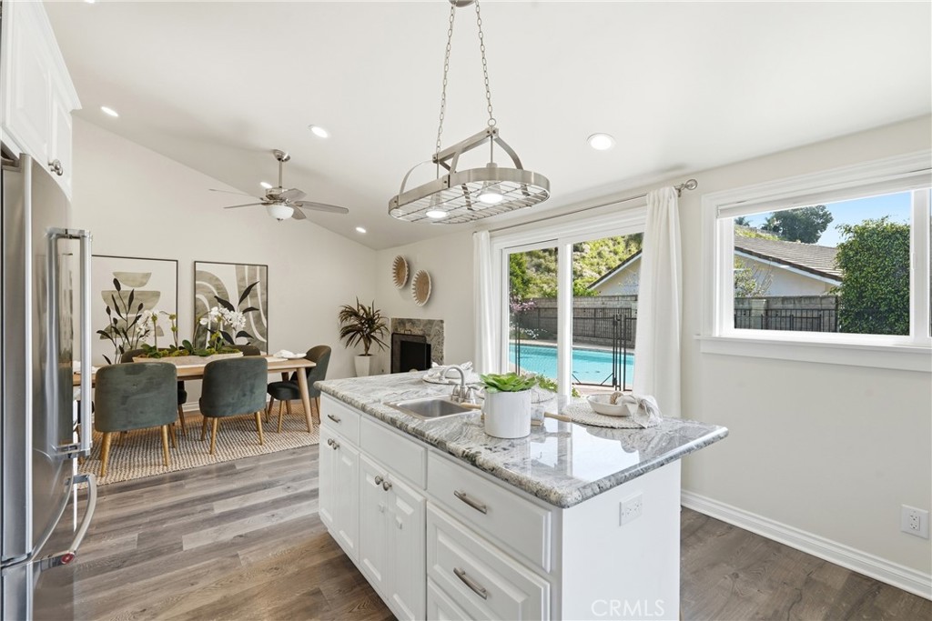 3240 Brace Canyon Road Burbank, CA 91504 - Photo 16 of 39 a kitchen island with granite countertop lots of counter top space