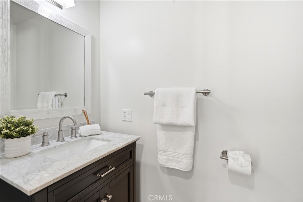 3240 Brace Canyon Road Burbank, CA 91504 - Photo 17 of 39 a bathroom with a sink and a mirror