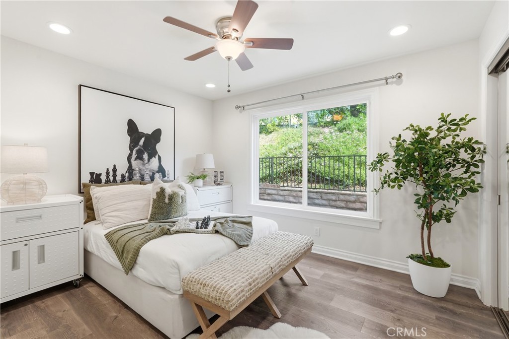 3240 Brace Canyon Road Burbank, CA 91504 - Photo 19 of 39 a living room with furniture and a potted plant