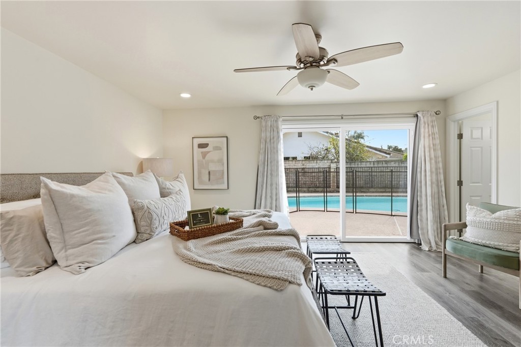 3240 Brace Canyon Road Burbank, CA 91504 - Photo 22 of 39 a bed room with a bed and a large window