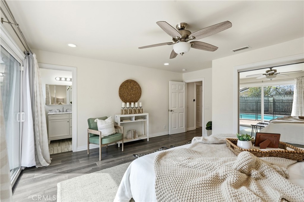 3240 Brace Canyon Road Burbank, CA 91504 - Photo 23 of 39 a bedroom with a bed and a window