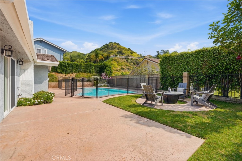 3240 Brace Canyon Road Burbank, CA 91504 - Photo 25 of 39 a view of a house with backyard porch and sitting area