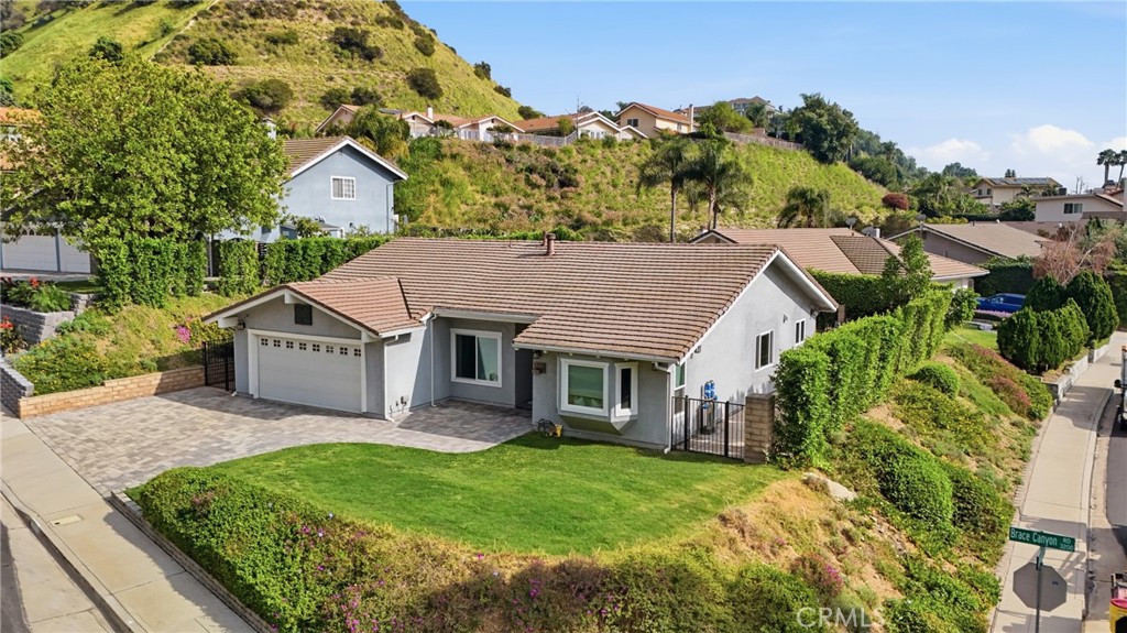 3240 Brace Canyon Road Burbank, CA 91504 - Photo 29 of 39 a front view of a house with garden