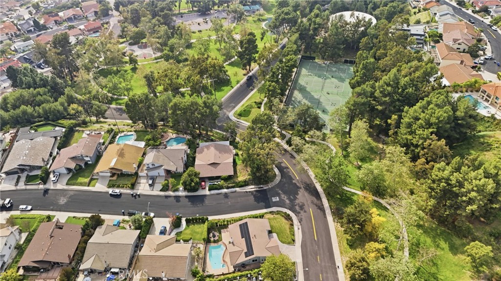 3240 Brace Canyon Road Burbank, CA 91504 - Photo 38 of 39 an aerial view of a house with a yard and large trees