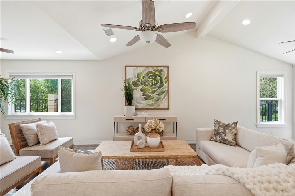 3240 Brace Canyon Road Burbank, CA 91504 - Photo 4 of 39 a living room with furniture and a large window