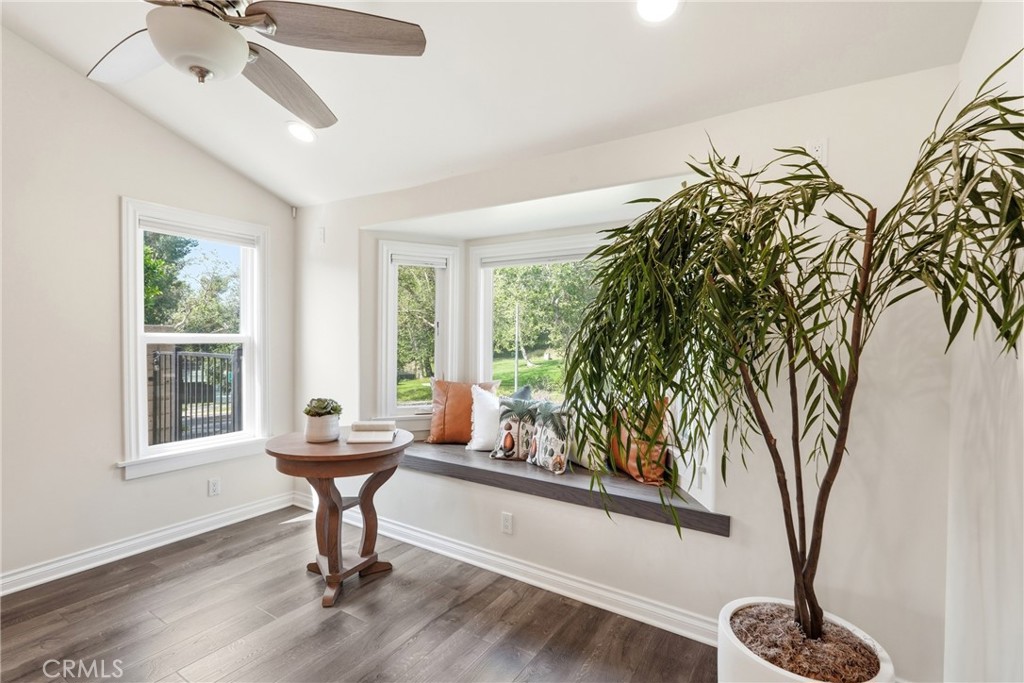 3240 Brace Canyon Road Burbank, CA 91504 - Photo 6 of 39 a living room with furniture and a potted plant