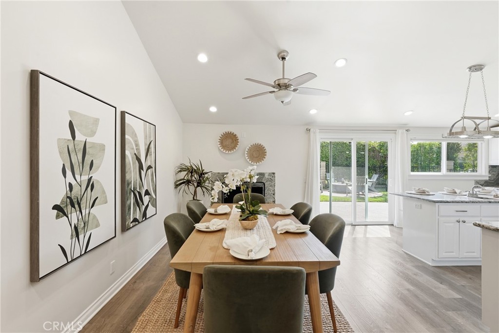 3240 Brace Canyon Road Burbank, CA 91504 - Photo 8 of 39 a view of a dining room with furniture window and wooden floor
