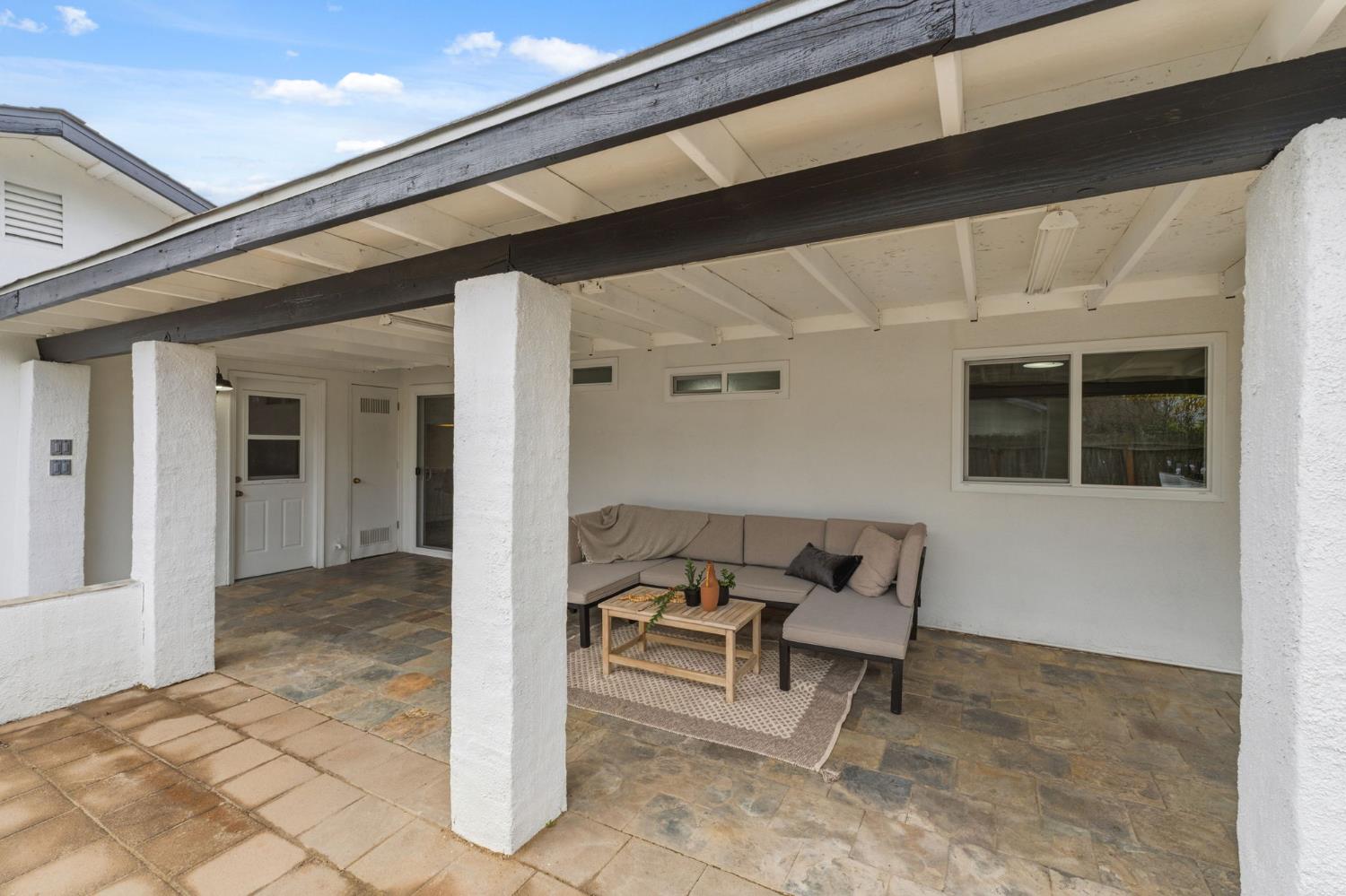 1601 Sonora Street Madera, CA 93638 - Photo 31 of 47 a view of a patio with chair and tables