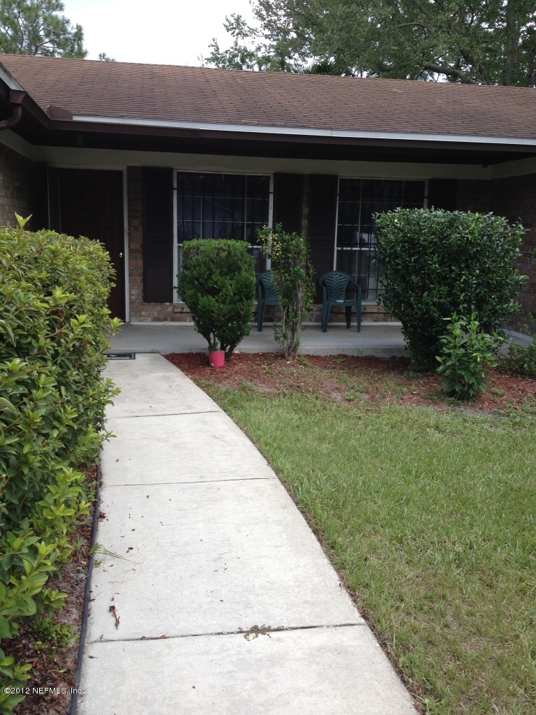3969 Bramble Road Jacksonville, FL 32210 - Photo 1 of 12 Front of home
