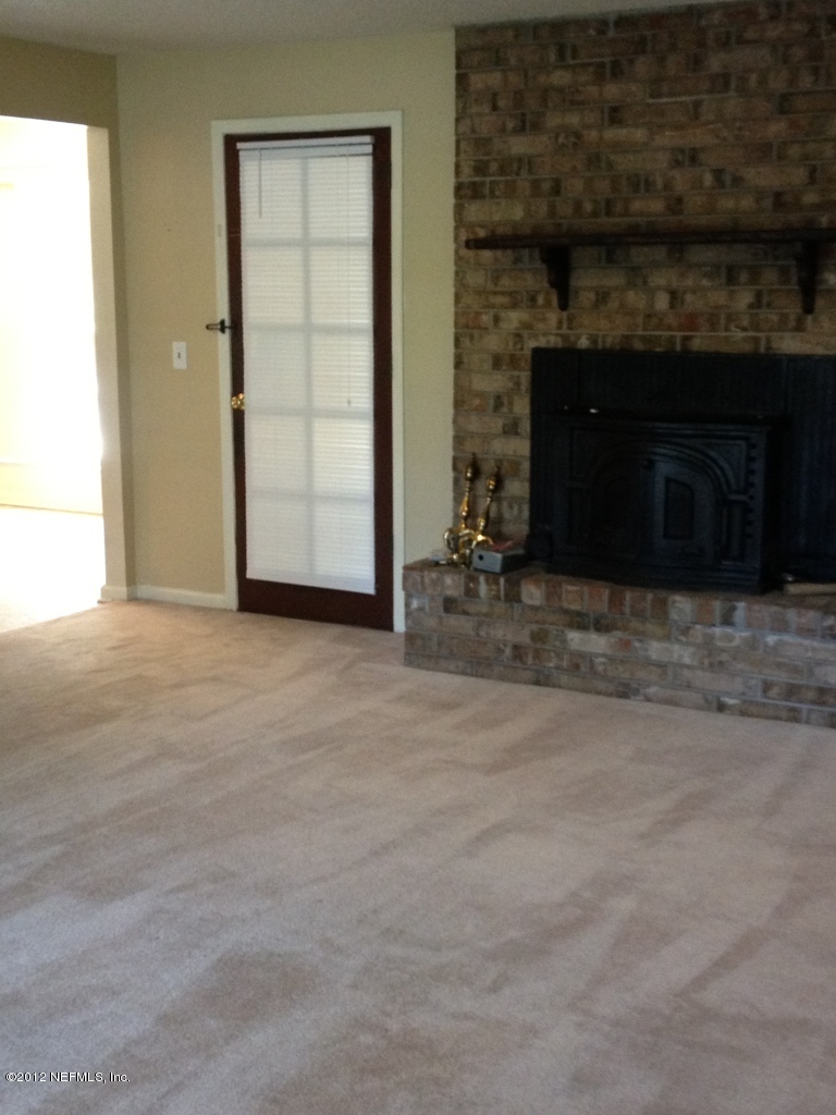 3969 Bramble Road Jacksonville, FL 32210 - Photo 2 of 12 Living Room to Back Door