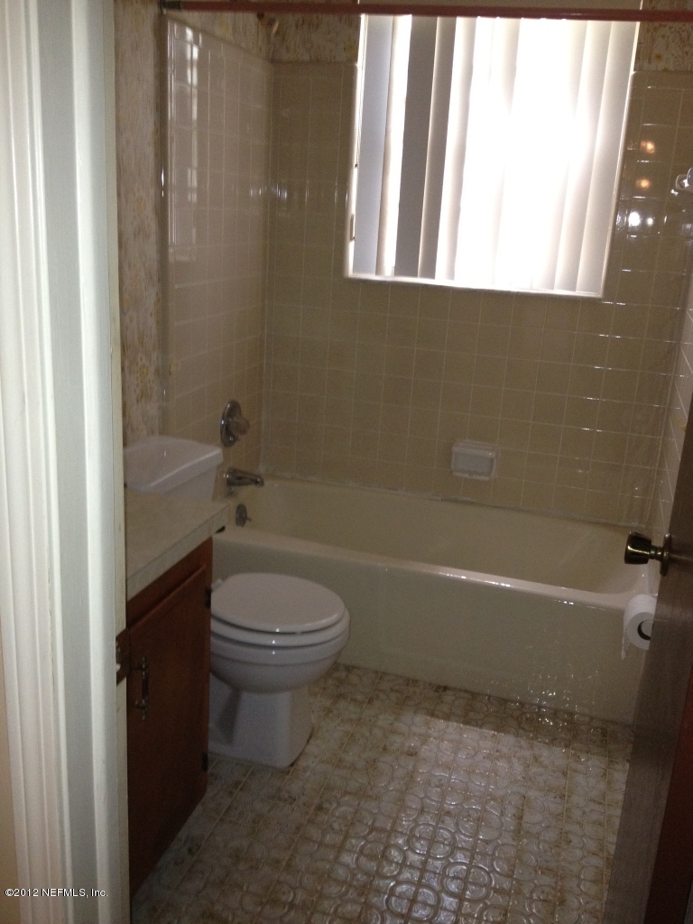 3969 Bramble Road Jacksonville, FL 32210 - Photo 8 of 12 Hall Bathroom
