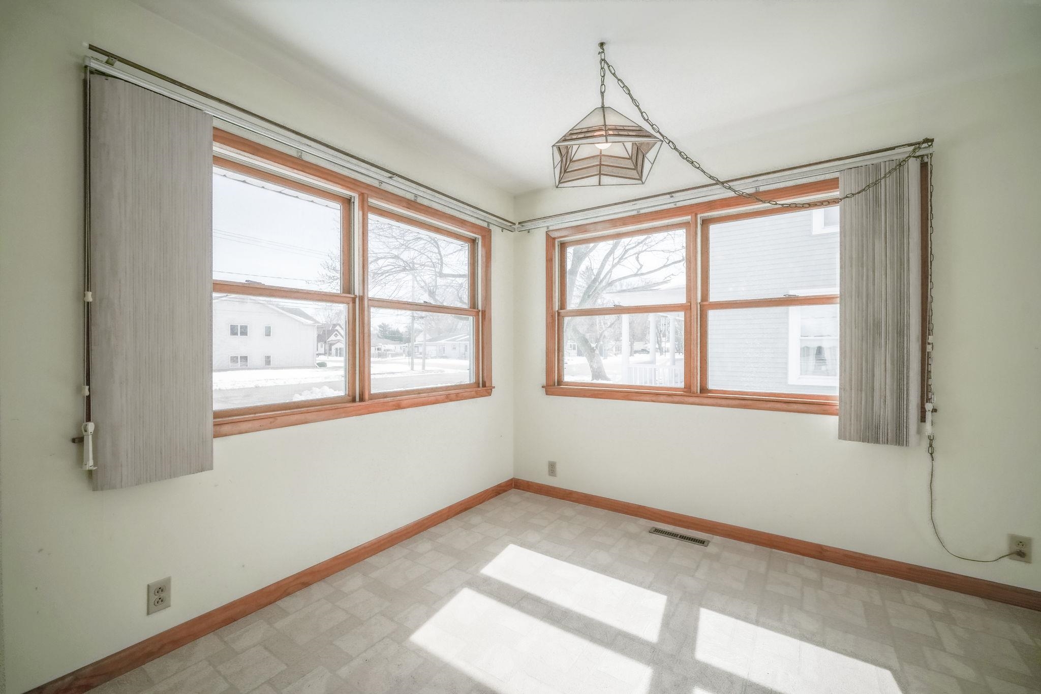 808 South 5th Street Oregon, IL 61061 - Photo 11 of 39 a view of an empty room with a window