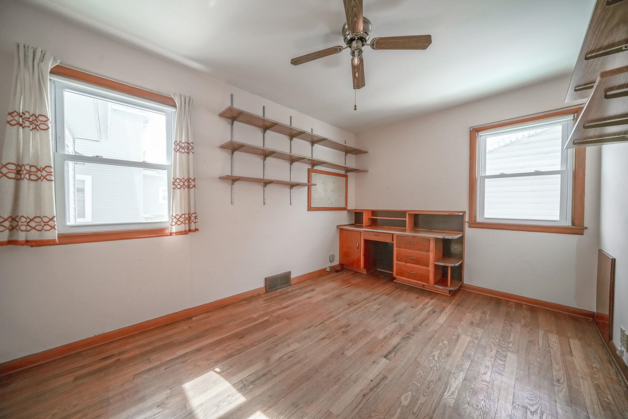 808 South 5th Street Oregon, IL 61061 - Photo 20 of 39 a view of a room with wooden floors and windows