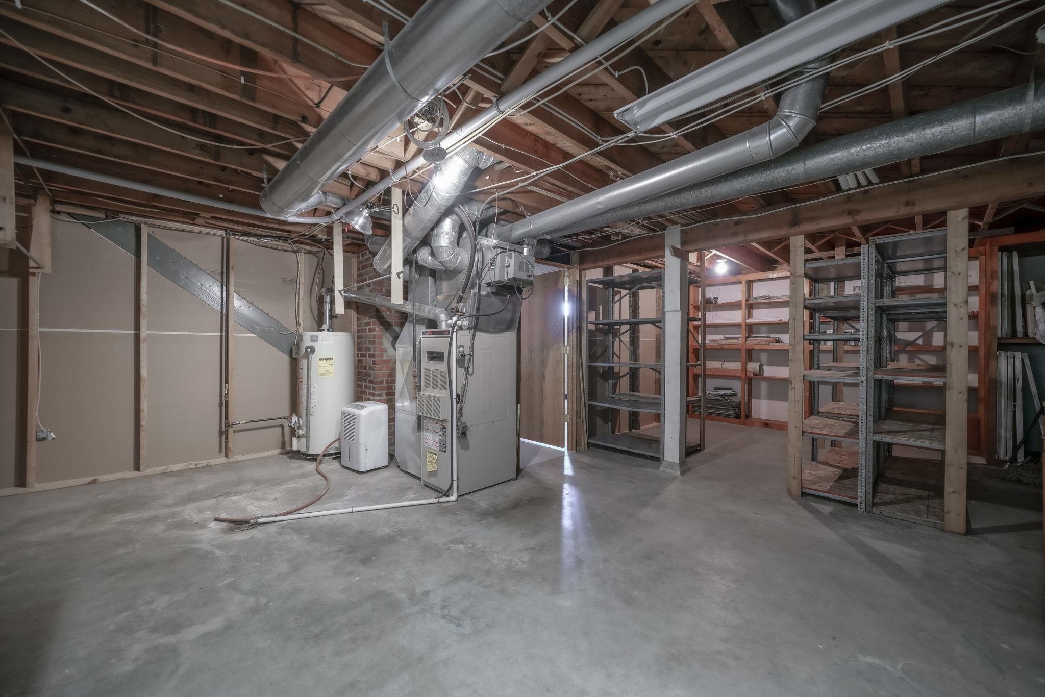 808 South 5th Street Oregon, IL 61061 - Photo 29 of 39 a view of water heater room with an empty space