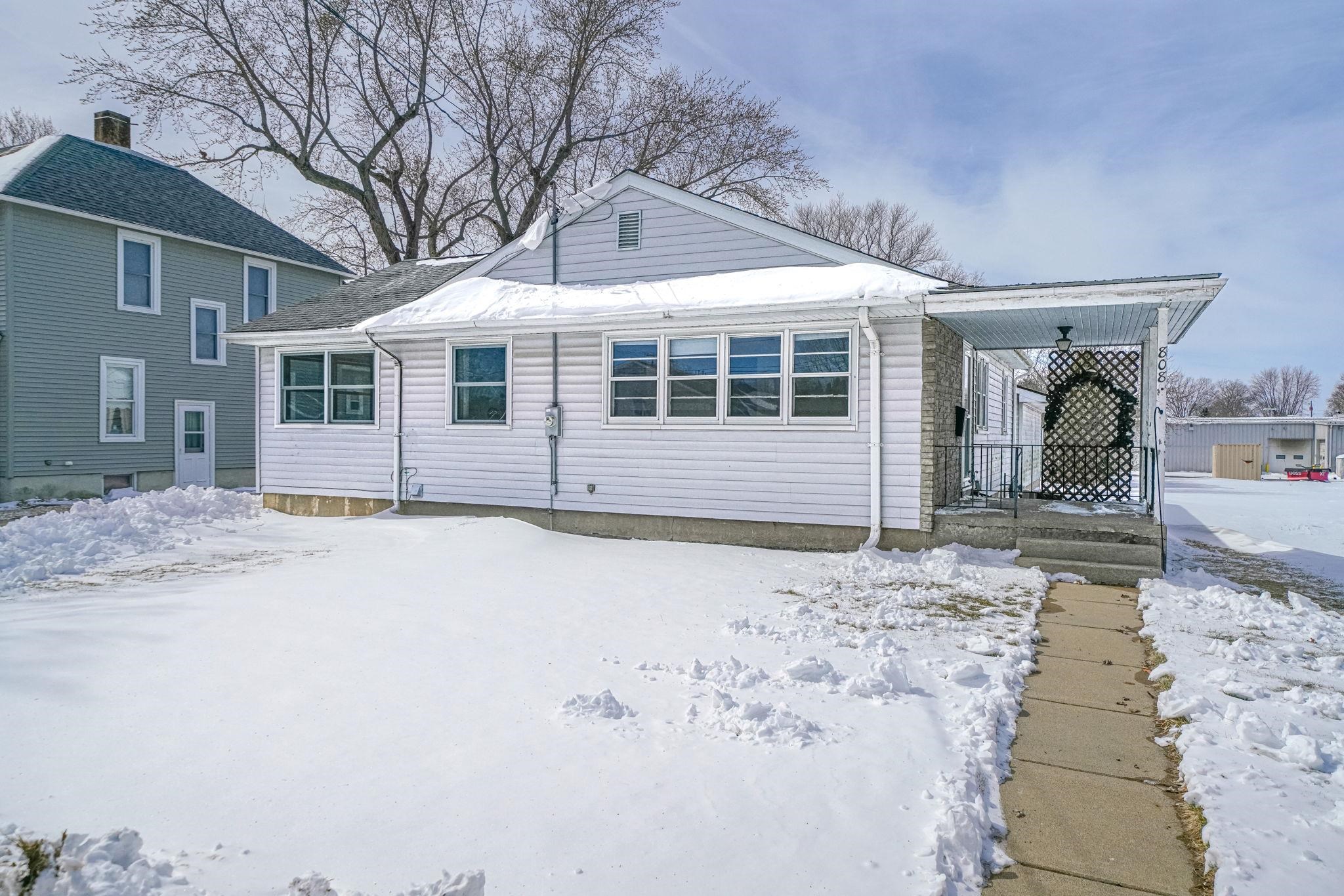 808 South 5th Street Oregon, IL 61061 - Photo 35 of 39 a front view of a house with a yard
