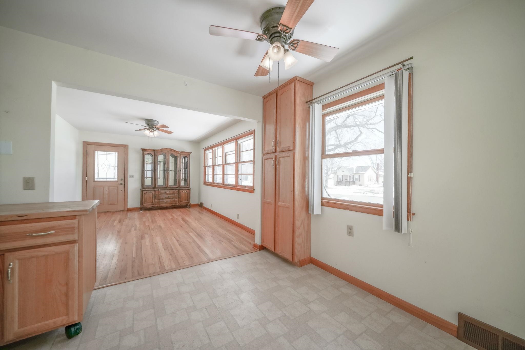 808 South 5th Street Oregon, IL 61061 - Photo 9 of 39 a view of an empty room with a window and wooden floor