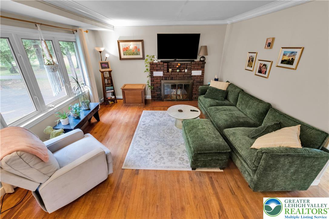 2242 Church Road Bethlehem, PA 18015 - Photo 12 of 74 a living room with furniture and a flat screen tv