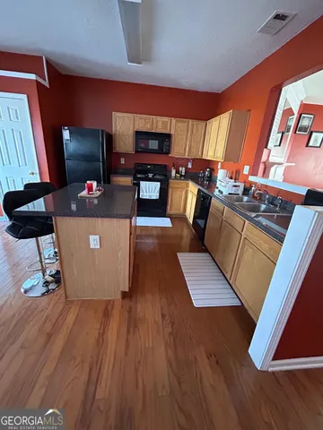 a bathroom with a toilet and a sink