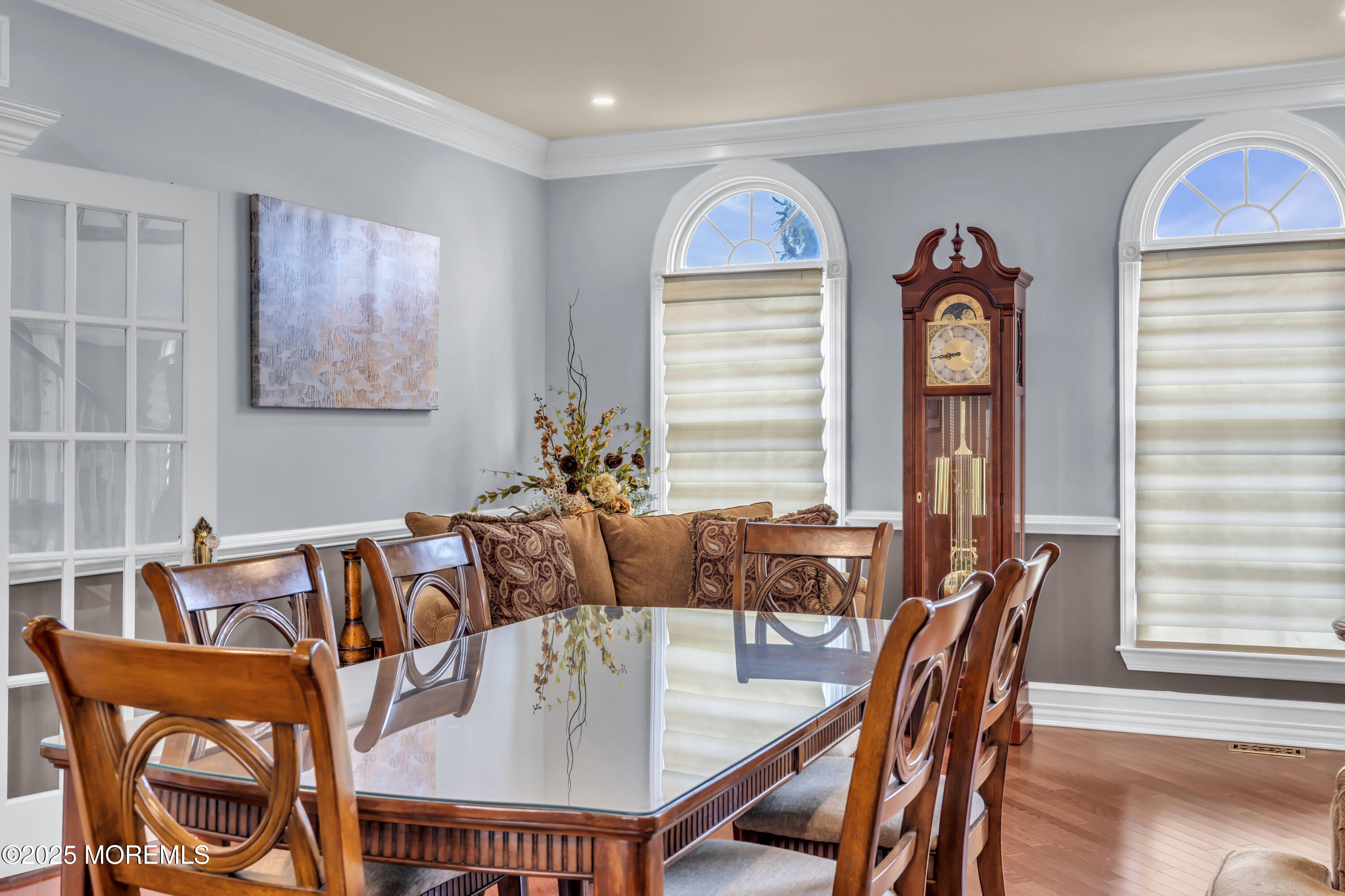 12 Courtney Court Freehold, NJ 07728 - Photo 21 of 99 a view of a dining room with furniture window and wooden floor