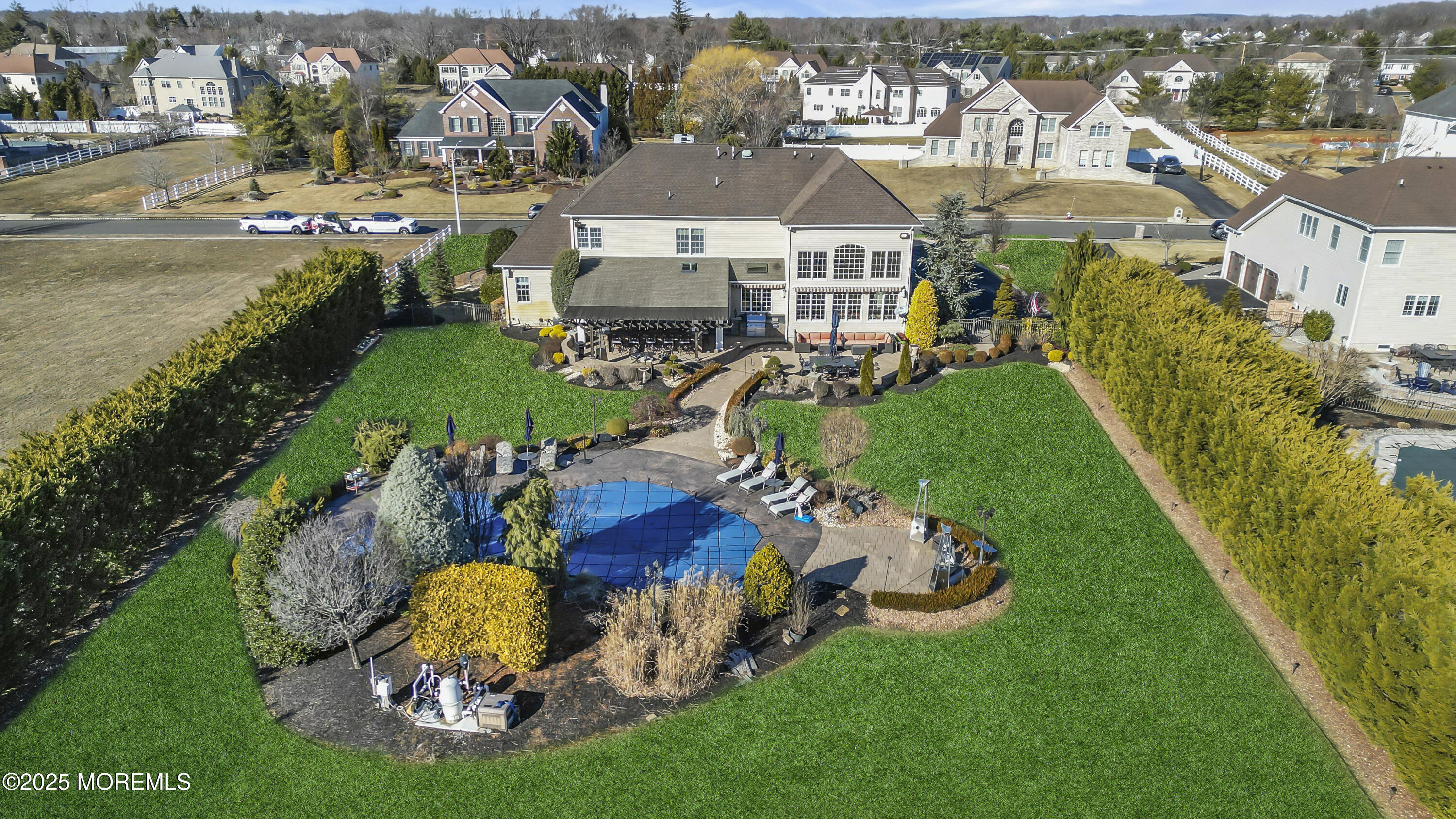 12 Courtney Court Freehold, NJ 07728 - Photo 47 of 99 an aerial view of a house with swimming pool outdoor seating and yard