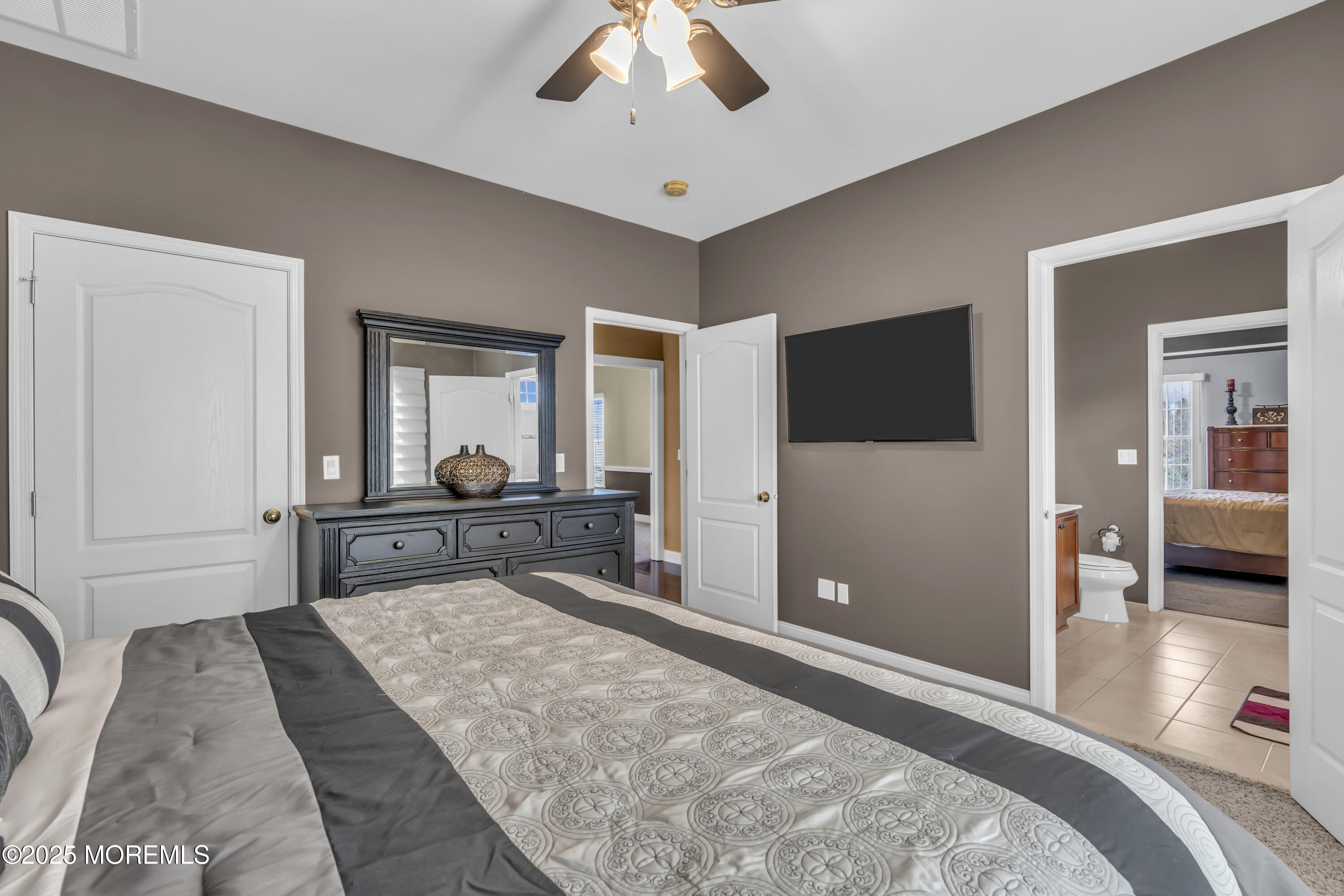 12 Courtney Court Freehold, NJ 07728 - Photo 72 of 99 a bedroom with a bed and a large mirror