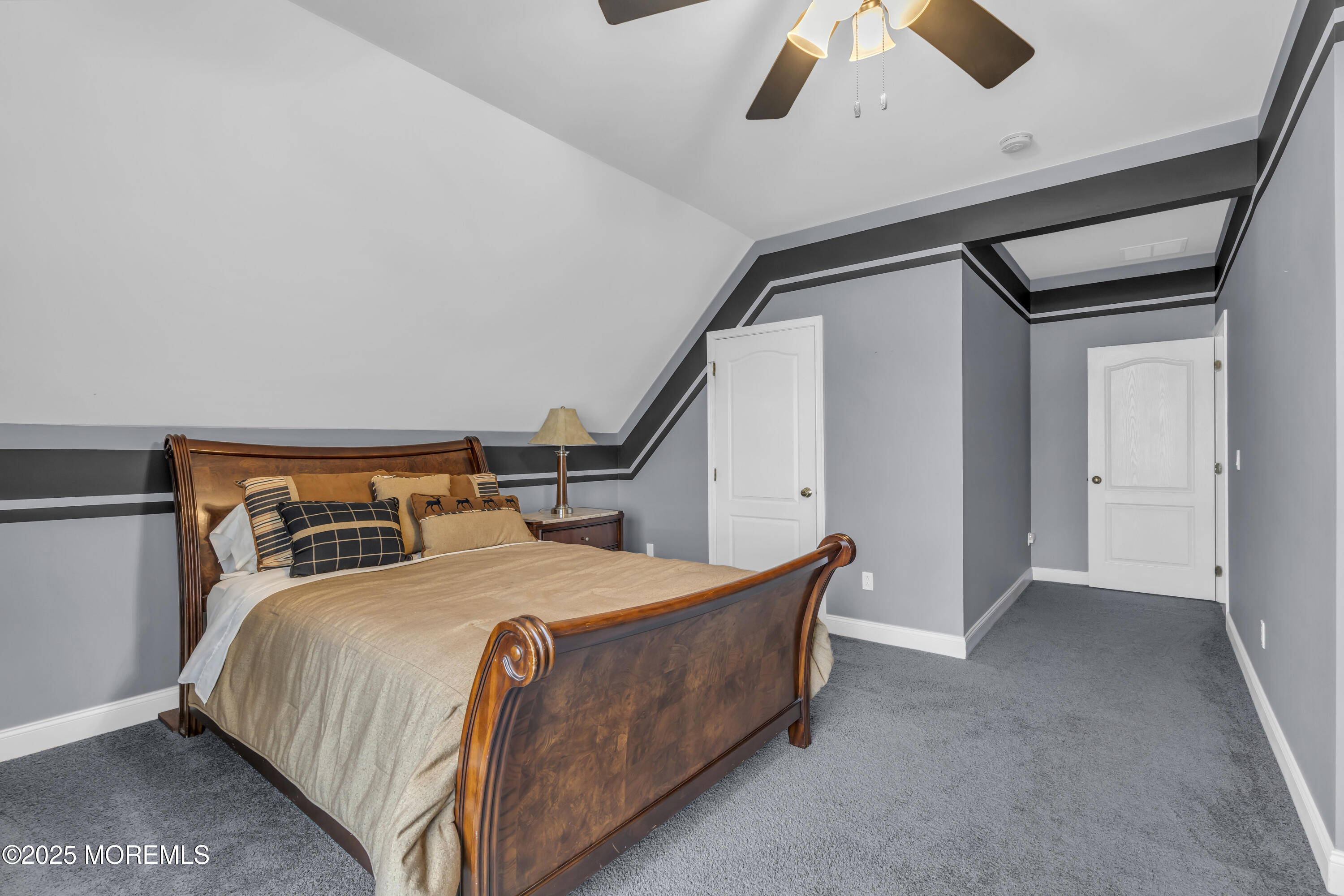 12 Courtney Court Freehold, NJ 07728 - Photo 76 of 99 a bedroom with a bed and a ceiling fan