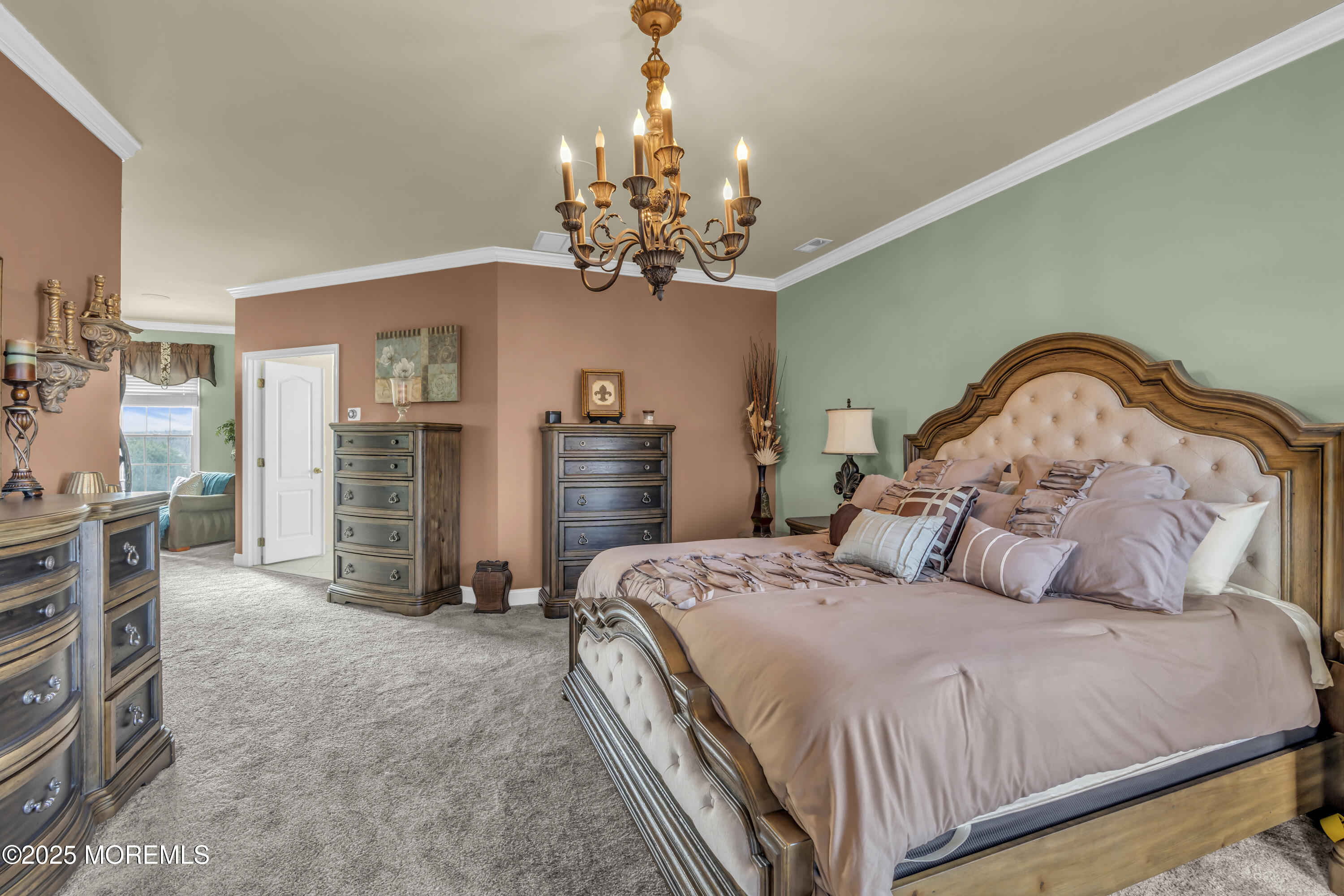 12 Courtney Court Freehold, NJ 07728 - Photo 99 of 99 a bedroom with a bed and a chandelier