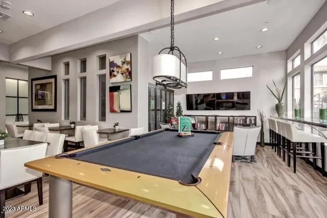 a view of a living room and kitchen