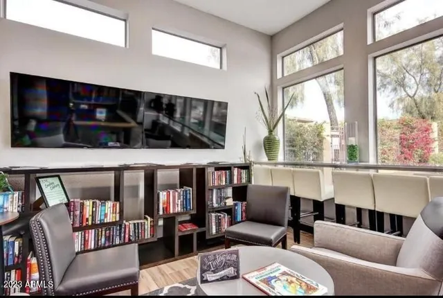 a living room with furniture and a window