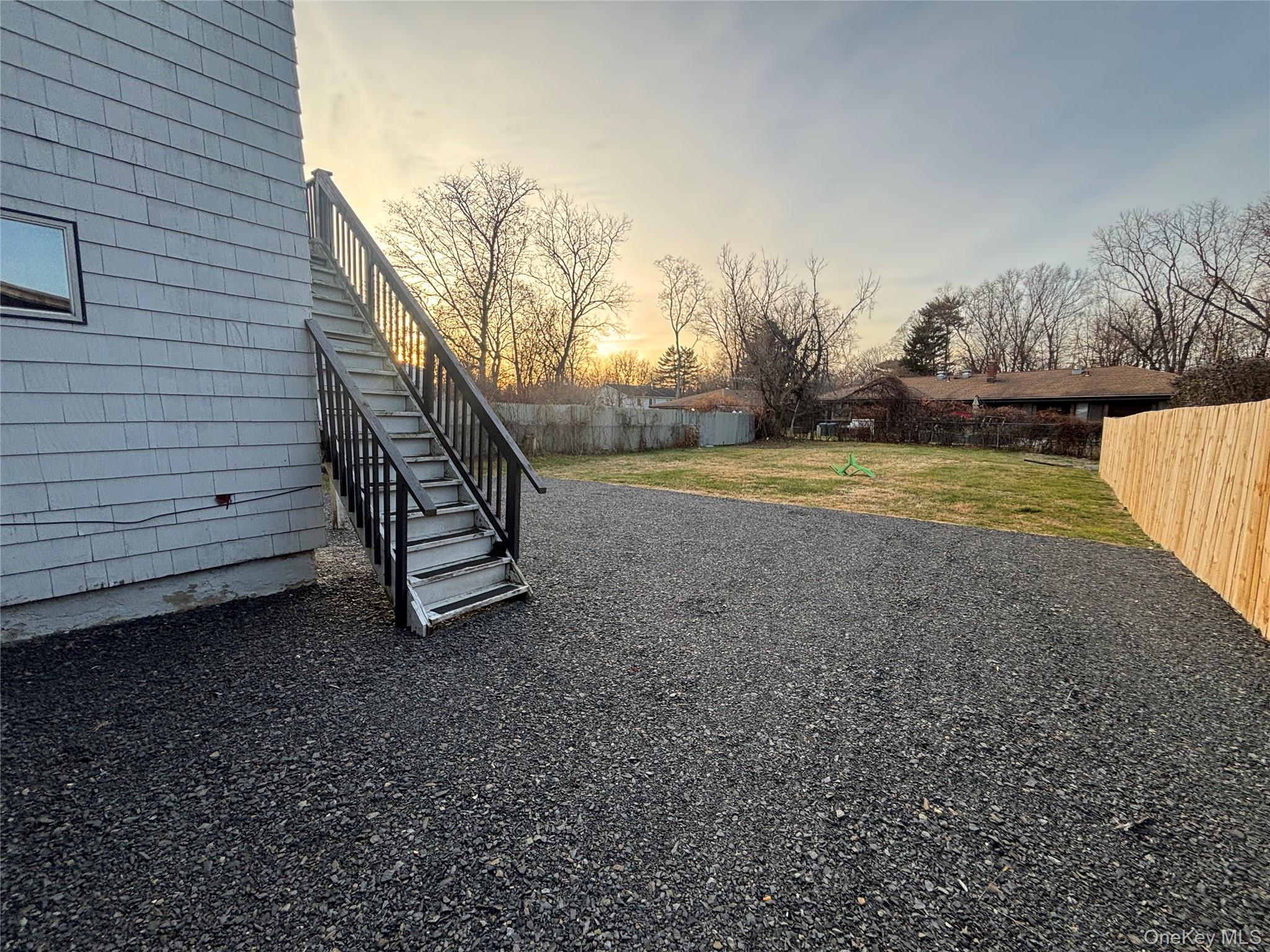 114 Sprague Avenue, Unit 2 Middletown, NY 10940 - Photo 11 of 13 Fenced backyard with stairway