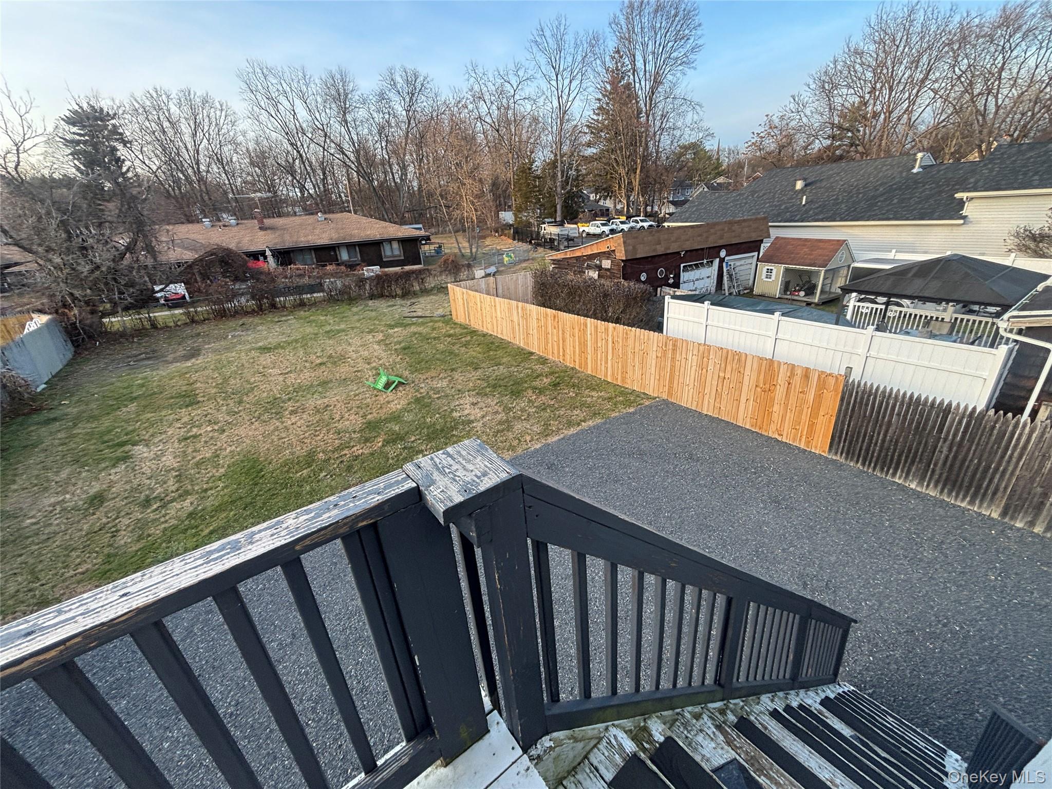 114 Sprague Avenue, Unit 2 Middletown, NY 10940 - Photo 12 of 13 Fenced backyard with a residential view