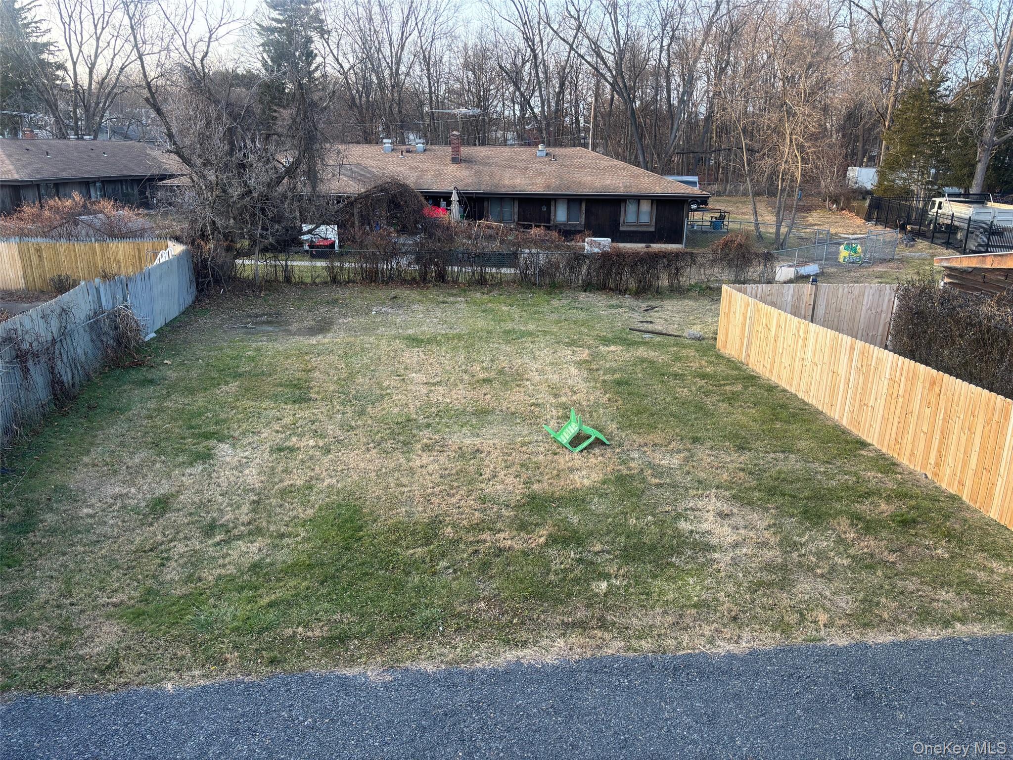 114 Sprague Avenue, Unit 2 Middletown, NY 10940 - Photo 13 of 13 View of yard featuring view of wooded area