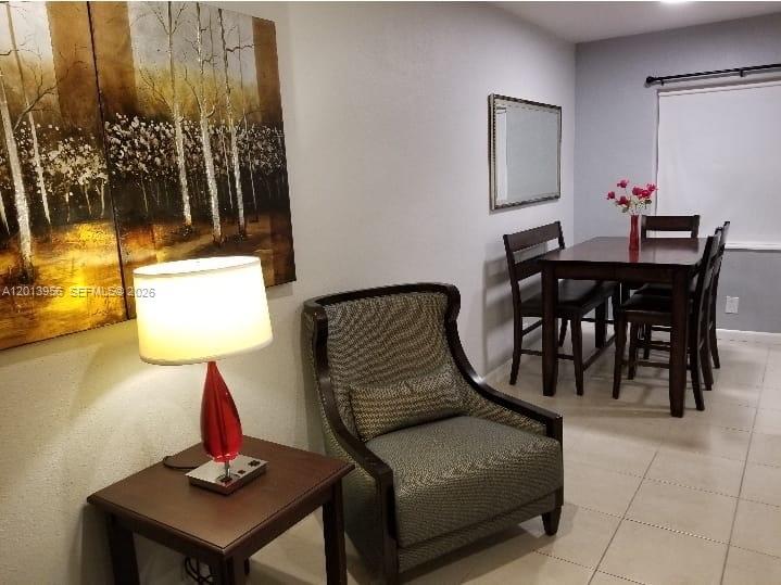 2023 Funston Street, Unit 2 Hollywood, FL 33020 - Photo 3 of 17 a view of a workspace with furniture