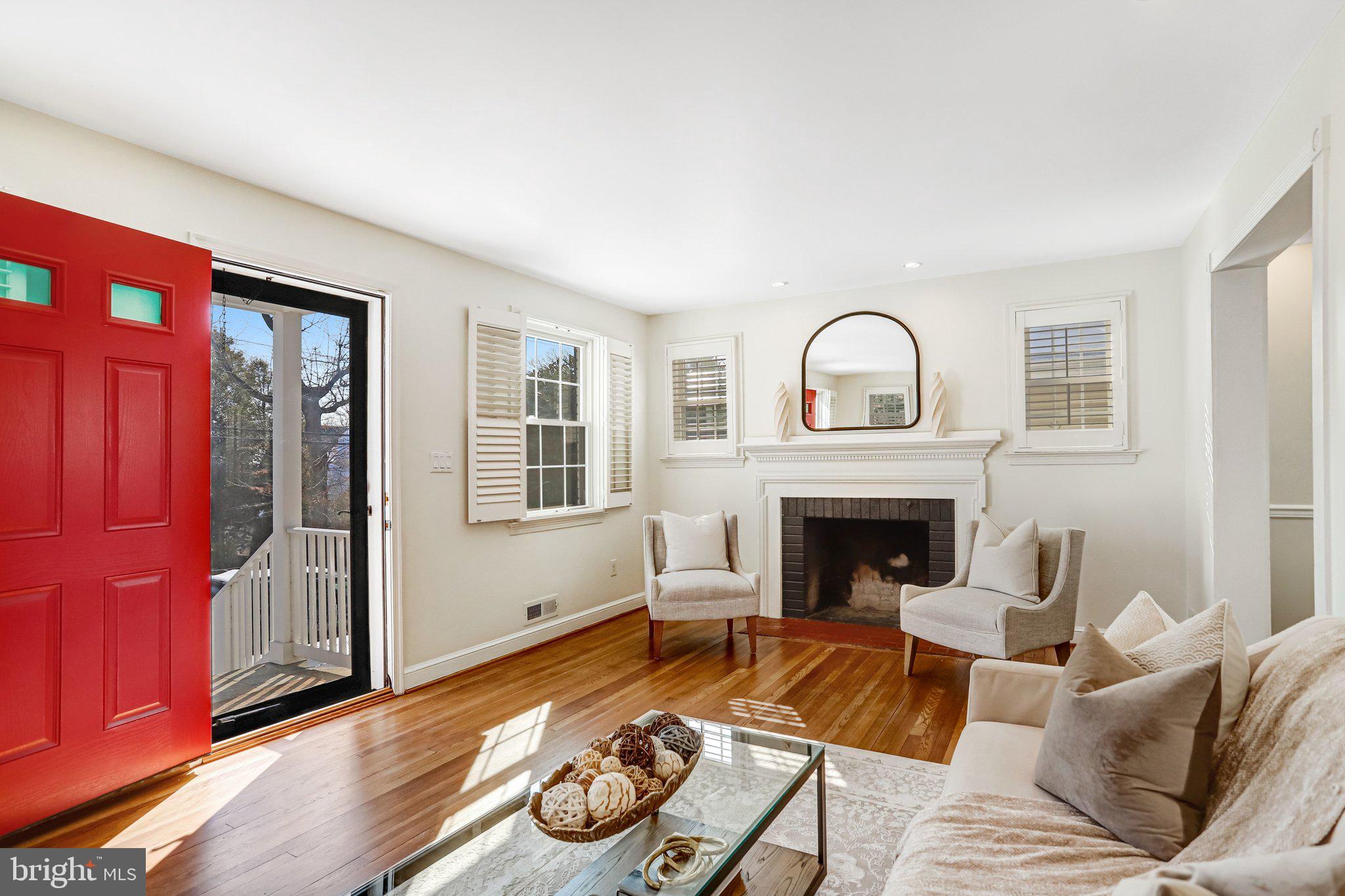 2708 Sycamore Street Alexandria, VA 22305 - Photo 13 of 71 a living room with furniture and a fireplace