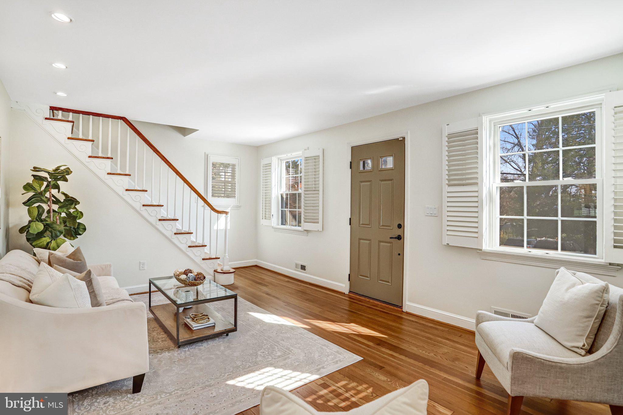 2708 Sycamore Street Alexandria, VA 22305 - Photo 14 of 71 a living room with furniture and stairs