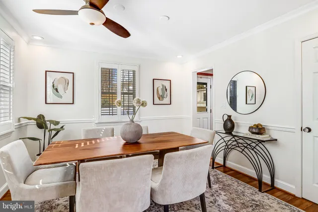 a view of a living room and dining room