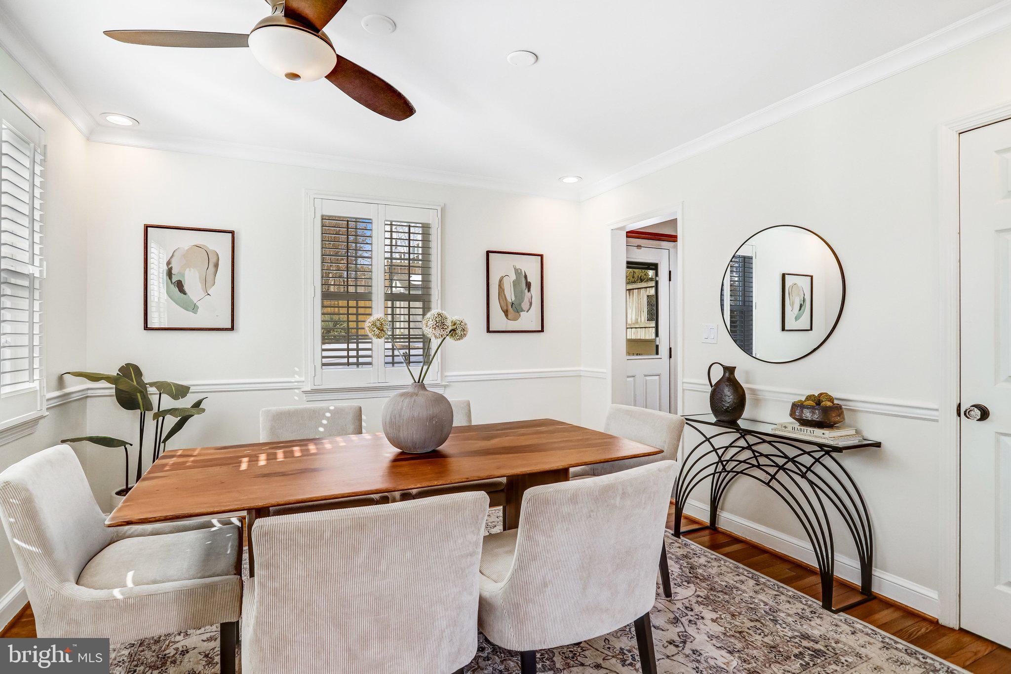 2708 Sycamore Street Alexandria, VA 22305 - Photo 16 of 71 a dining room with furniture and a mirror