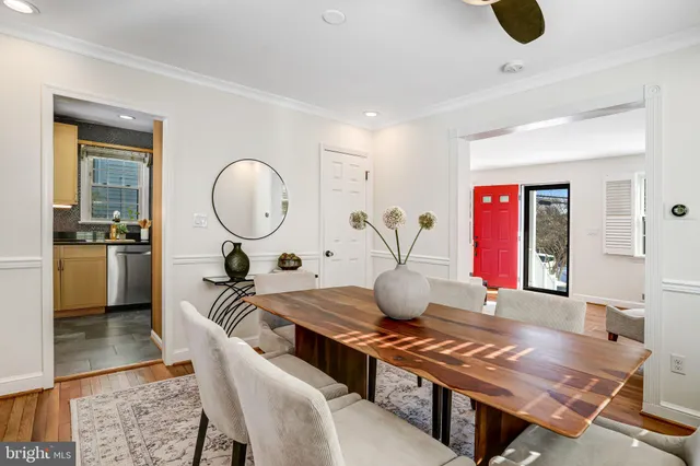 a kitchen with stainless steel appliances a refrigerator stove and sink