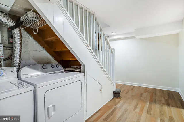 a bathroom with a sink a vanity and a mirror