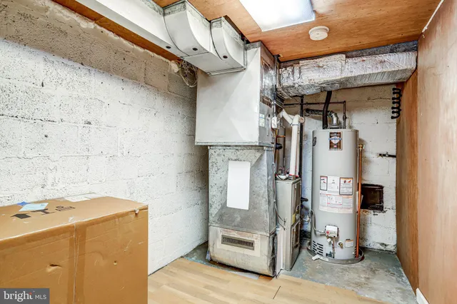 a view of a house with yard and sitting area