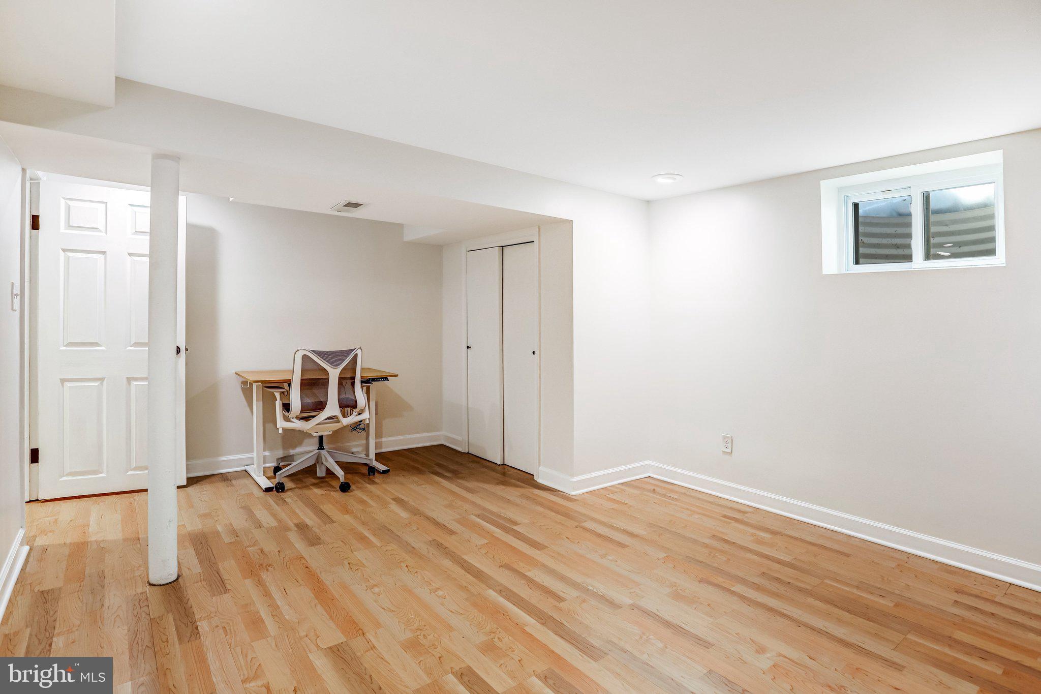 2708 Sycamore Street Alexandria, VA 22305 - Photo 43 of 71 a view of room with a window and wooden floor