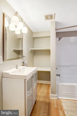 a patio with a patio table and chairs